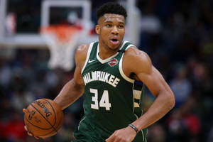 Giannis Antetokounmpo Dribbling Ball Wallpaper