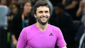 Gilles Simon Celebrating A Winning Shot In Tennis Match Wallpaper
