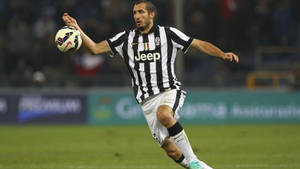 Giorgio Chiellini Football Match Kick Wallpaper