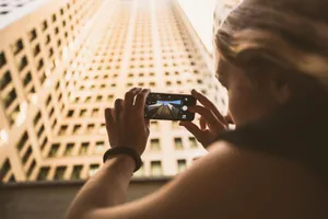 Girl And Tall Building Photography Via Iphone Wallpaper
