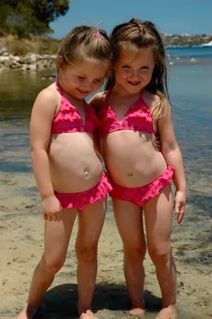 Girl Sister Pink Swimsuit Wallpaper