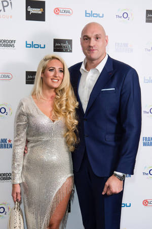 Glamorous Couple Paris And Tyson Fury Wallpaper