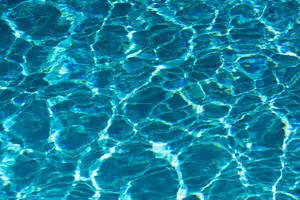 Glaring Blue Pool Water Wallpaper