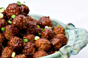 Glazed Meatballsin Ceramic Dish Wallpaper