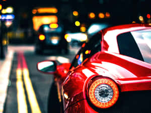 Gleaming Red Ferrari After Professional Car Detailing Wallpaper