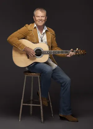 Glen Campbell: A Timeless Musical Legend Wallpaper