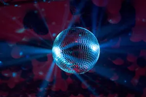 Glimmering Disco Ball Nightlife Vibe Wallpaper