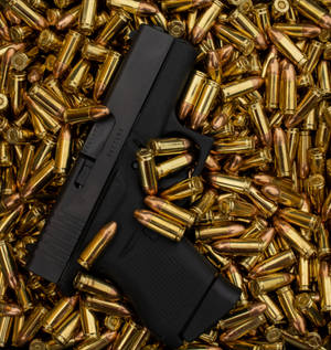 Glock On Top Of Bullets Wallpaper