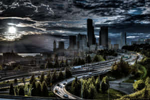 Gloomy Skies Of Seattle At Night Wallpaper