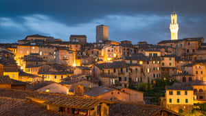 Glowing Tower Of Mangja In Siena Wallpaper