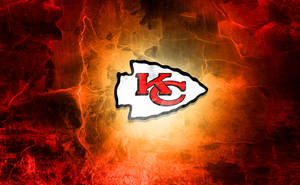 Go Chiefs! Show Your Team Spirit With This Vibrant Kansas City Chiefs Cool Logo Wallpaper. Wallpaper