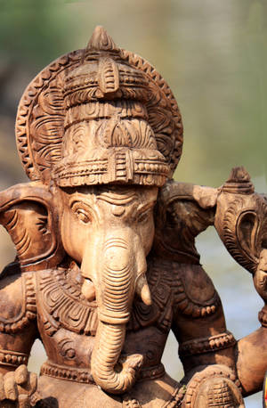 God Ganesh Wooden Statue Wallpaper