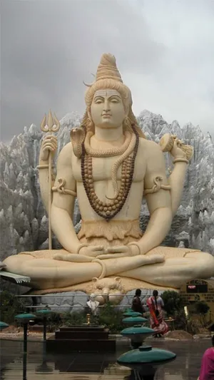 God Shiva Statue With Tourists Wallpaper