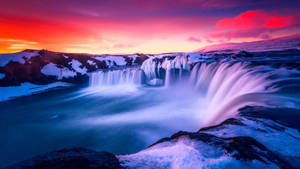 Godafoss Waterfall On A Summer Day Wallpaper