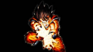 Goku Faces Challenges As He Charges Up For Battle Wallpaper