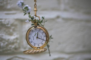 Gold Pocket Watch Close-up Wallpaper