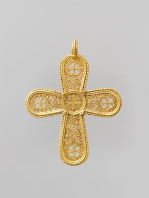 Golden Cross Pendant Symbolizing Christianity Wallpaper