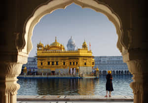 Golden Temple Behind Arch Wallpaper