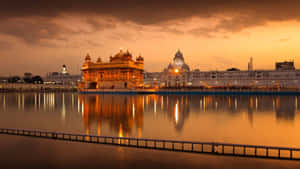 Golden Temple Complex At Dusk Wallpaper