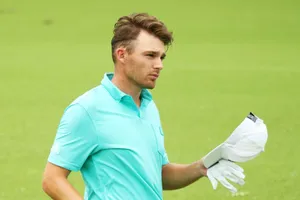Golfer Aaron Wise Removing His White Cap Wallpaper