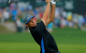 Golfer Mid Swing Action Wallpaper