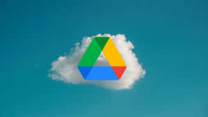 Google Drive With Clouds Behind Wallpaper