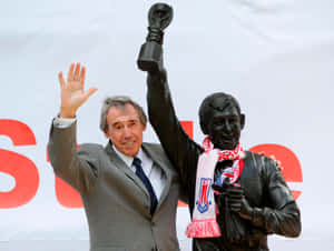 Gordon Banks Next To Black Statue Wallpaper