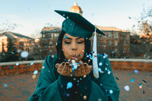 Graduate Woman Success Celebration Wallpaper