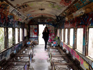 Graffiti Adorned Abandoned Train Carriage Wallpaper