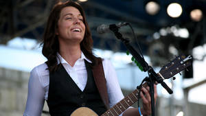 Grammy-winning Singer Brandi Carlile Rocking In Her Signature Vest Wallpaper