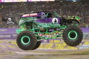 Grave Digger Monster Truck During Race Wallpaper