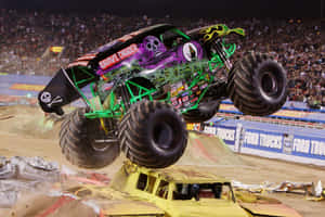 Grave Digger Monster Truck Going Upwards Wallpaper