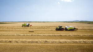 Green And White Claas Tractor Wallpaper