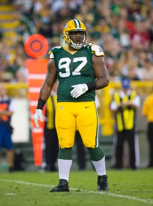 Green Bay Packers Kenny Clark Versus Oakland Raiders Wallpaper