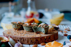 Green Cupcakes With Fruits Wallpaper