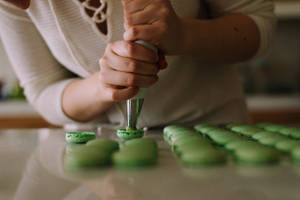 Green Macarons Pastry Wallpaper