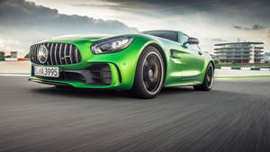 Green Mercedes-benz Amg Speeding Wallpaper