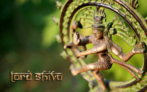 Green Metal Nataraja Figurine Wallpaper