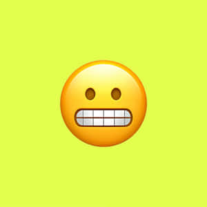 Grimacing Emoji Yellow Background Wallpaper