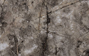 Grungy Stone Wall With Cracks Wallpaper