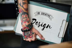 Hand Tattoo With Be Creative Clipboard Design Wallpaper