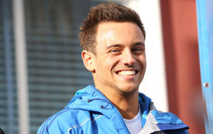 Handsome Grinning Tom Daley Wallpaper