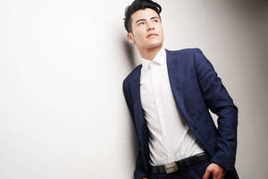 Handsome Man In Blue Blazer Wallpaper