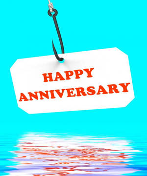 Happy Anniversary Greetings On Fish Hook Wallpaper