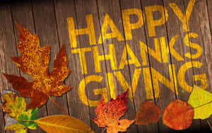 Happy Thanksgiving With Leaves And A Yellow Text Wallpaper