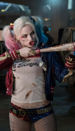 Harley Quinn In A Costume Holding A Bat Wallpaper