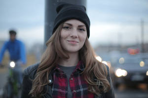 Headshot Of A Girl Donning A Winter Bonnet Wallpaper