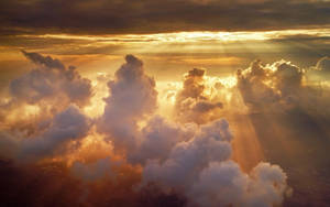 “heavenly Clouds Dazzle With Colorful Light” Wallpaper