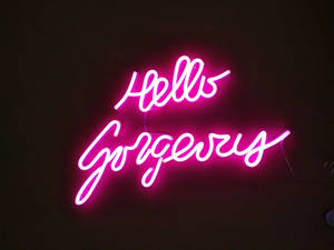 Hello Gorgeous Neon Pink Greeting Wallpaper