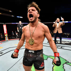 Henry Cejudo Knocking Out Marlon Moraes At Ufc 238 Wallpaper